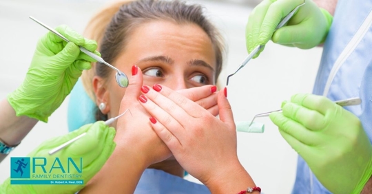 woman scared at the dentist